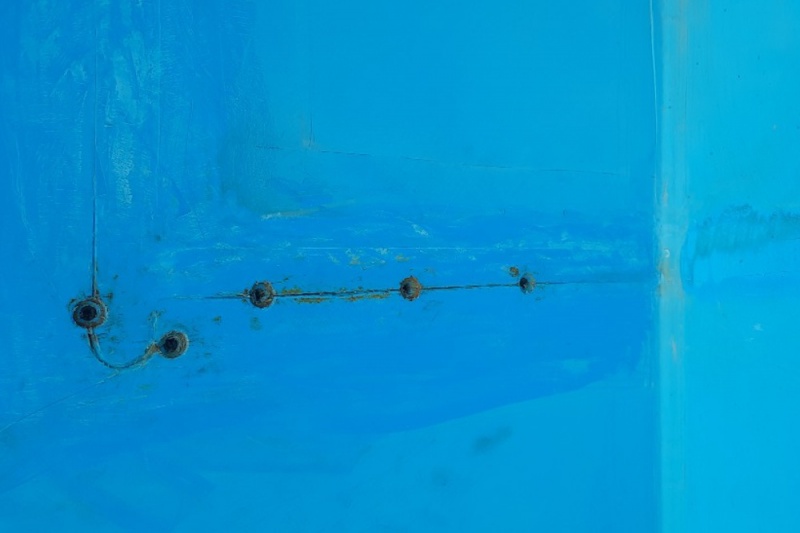 Oprava a přeplátování stěny bazénu